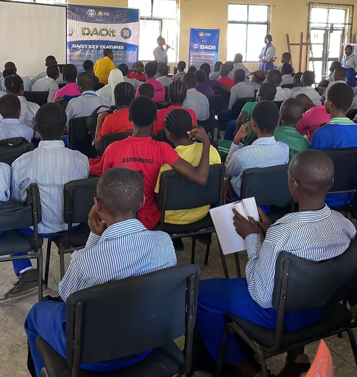 Nigerian secondary school students attending a DAOit education platform presentation in Abuja